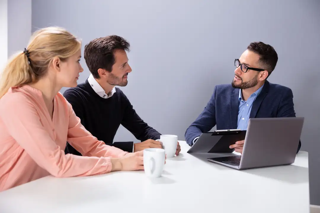 Financial Advisor in Geneva PCC Advisor helping working couple